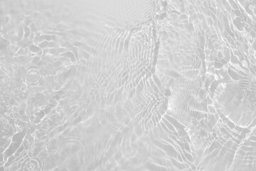 White water with ripples on the surface. Defocus blurred transparent white colored clear calm water...