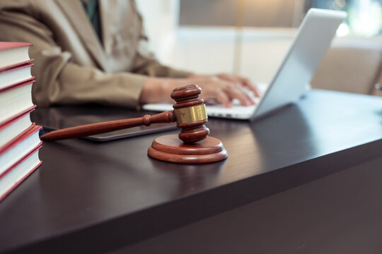 Judge, male lawyer discuss legal services for businessmen, give advice on contracts, plan court cases.