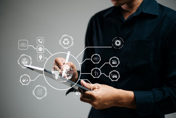 Man using futuristic interface with smart tech and mobile to manage ESG, clean energy, and sustainability data.