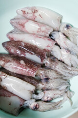 Close-up of raw squid in a bowl