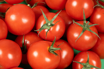 Close-up of a group of fresh whole cocktail tomatoes.