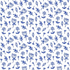 A seamless pattern of blue flowers and leaves on a white background in a hand drawn style...