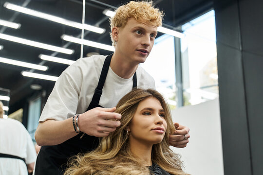 Modern beauty salon showcasing latest hair trends with skilled stylist at work