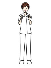 女性看護師の正面立ちポーズ　パンツスタイル　ガッツポーズ