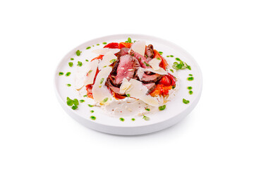 Delicious beef salad with fresh vegetables and shaved cheese served elegantly