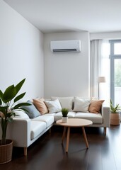 Modern white living room interior design with sofa full of pillows air conditioner on the wall houseplants small table contemporary comfortable apartment nobodyempty cozy scandinavian house home