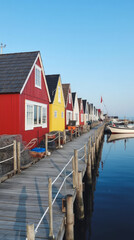 Smögen Fishing Village Sweden Brightly Colored Wooden Boathouses Lining the Dock
