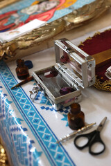 A box with church supplies for the baptism ceremony.