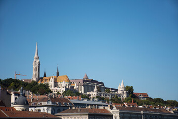 Obraz premium View landscape and cityscape of Budapest old town and Budapest Castle Hill or Buda Castle Royal Palace with Danube Delta river and Budapest Chain Bridge with tour cruises in Budapest, Hungary