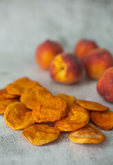 Peach and dried peach on a white background