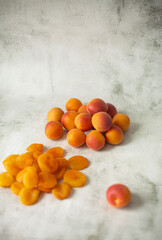 Apricot and dried apricot on a white background