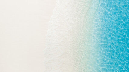 Tropical sandy beach with turquoise ocean water, aerial view. Top view of paradise beach in tropics...