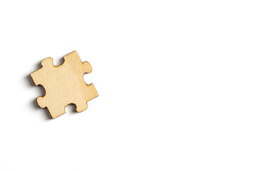 wooden jigsaw puzzle pieces isolated on white background.