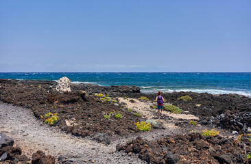Walking trail across volcanic coast