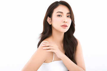 A beautiful young Asian woman with clean, fresh skin against a white background. Skincare, facial...