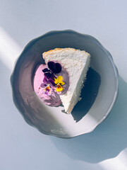 Cottage cheese casserole with blueberry yogurt and edible flowers
