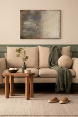 Composition of warm living room interior with mock up poster frame, sofa, green plaid, round pillow...