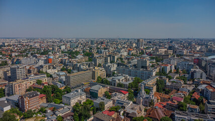 Expansive aerial view of Bucharest under a clear sky