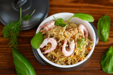 Beautiful rice dish with vegetables and seafood