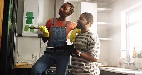 Smile, black couple painting and discussion in home for color choice, DIY art and decoration. Renovation, man and woman talking for remodeling, house improvement and interior design for kitchen - Powered by Adobe