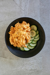 spicy buffalo chicken dip served with fresh cucumber slices