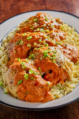 chicken paprikash on a bed of homemade spätzle