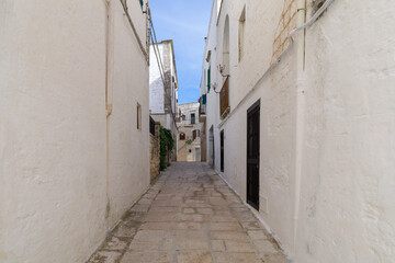 A street lined with white mansions in Cisternino, Apulia, Southern Italy