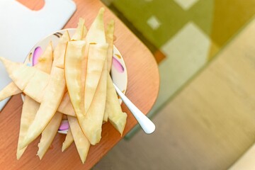 Plate filled with melon rinds after consumption, showcasing natural food waste and summer fruit...