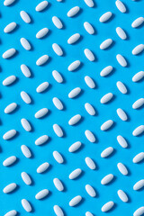 pills on a blue background	