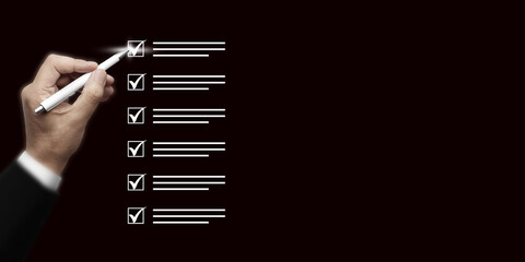 Hand Checking Off Items on a Checklist with Pen. Business Concept for Task Completion, Project...