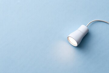 Naklejka premium Minimalist design featuring modern lamp casting soft light on bl