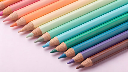 Naklejka premium Creative range of ombre colored pencils arranged in a vibrant gradient layout