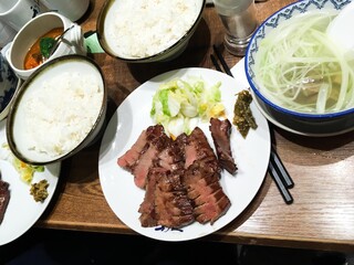 close up of Japanese charcoal grilled ox tongue slice served with rice and beef tail soup 