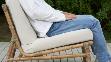 Comfortable seating in a natural outdoor setting enhances relaxation and leisure activities during...