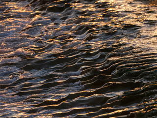 beautiful sea waves at sunset