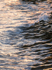 beautiful sea waves at sunset
