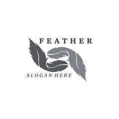 Obraz premium Feather Logo Vector Symbol Design