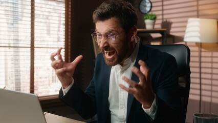 Angry furious stressed European business man working with laptop error computer online failure in...