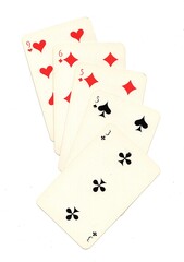 A hand of old playing cards from Russia isolated on a white background.