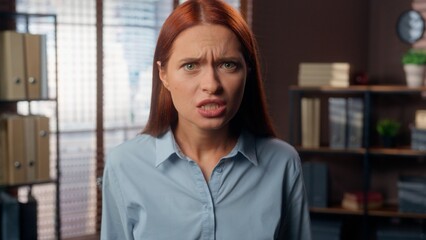 Portrait Caucasian girl angry furious rage mad aggressive business woman female worker...
