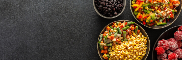 A variety of frozen veggies and fruits displayed in plates, set on a dark background, symbolizing the preparation and preservation of summer harvest for winter use, banner