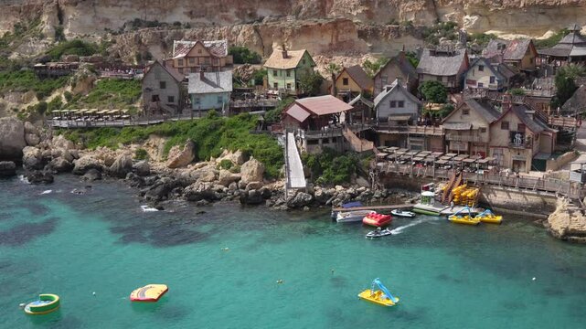 Scenic Views of Popeye Village, in Malta, with rustic and ramshackle wooden huts