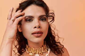 Young woman showcases summer style with natural beauty against vibrant background