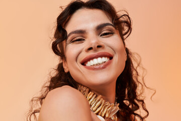 Joyful moments of a beautiful woman enjoying summer in stylish attire with radiant smile