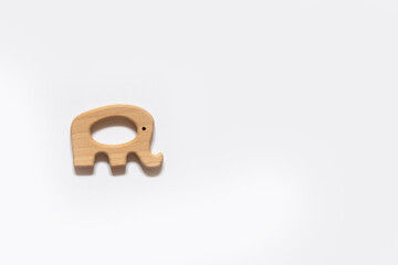 Minimalist wooden elephant toy captured against a white backdrop, illustrating simplicity and eco-friendly design. Ideal for children's toys, nursery decor, or educational resources.