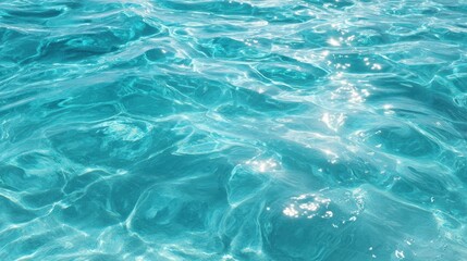 Obraz premium The sparkling turquoise water glistens under the warm sunlight.