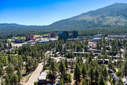 Aerial Panoramic view of Stateline South Lake Tahoe in California and Nevada with Hotels and casinos in the Forest surrounding the Lake.