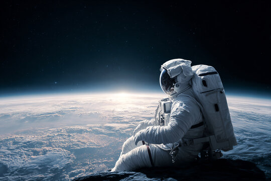 an astronaut sitting on a rock in the space