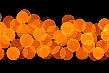 Abstract pattern of orange circles on black background