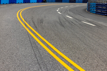 Abstract asphalt street road background with black tire marks on race track, Texture and background...
